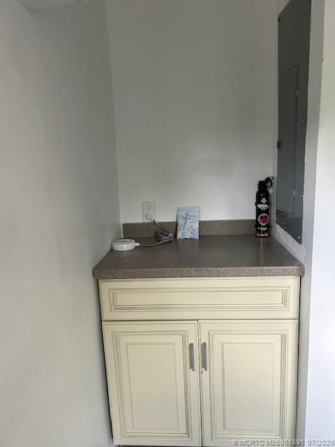 1944 Southwest College Street Stuart, FL 34997 - Photo 29 of 50 a close view of laundry room with a washer and dryer