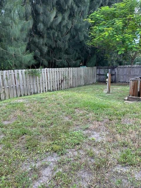 1944 Southwest College Street Stuart, FL 34997 - Photo 35 of 50 a view of a backyard with green space