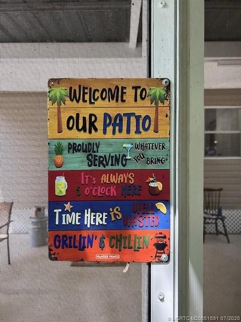 1944 Southwest College Street Stuart, FL 34997 - Photo 41 of 50 a sign on the side of a building