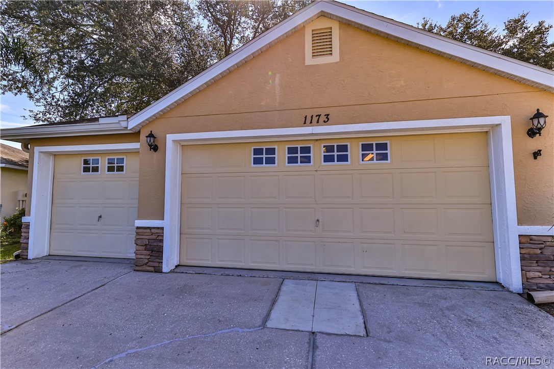1173 South Fieldview Loop Lecanto, FL 34461 - Photo 27 of 29 3 CAR GARAGE EXTERIOR PICTURE
