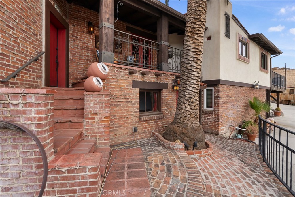 3240 Pachappa Hill Riverside, CA 92506 - Photo 12 of 75 a front view of a house with chairs