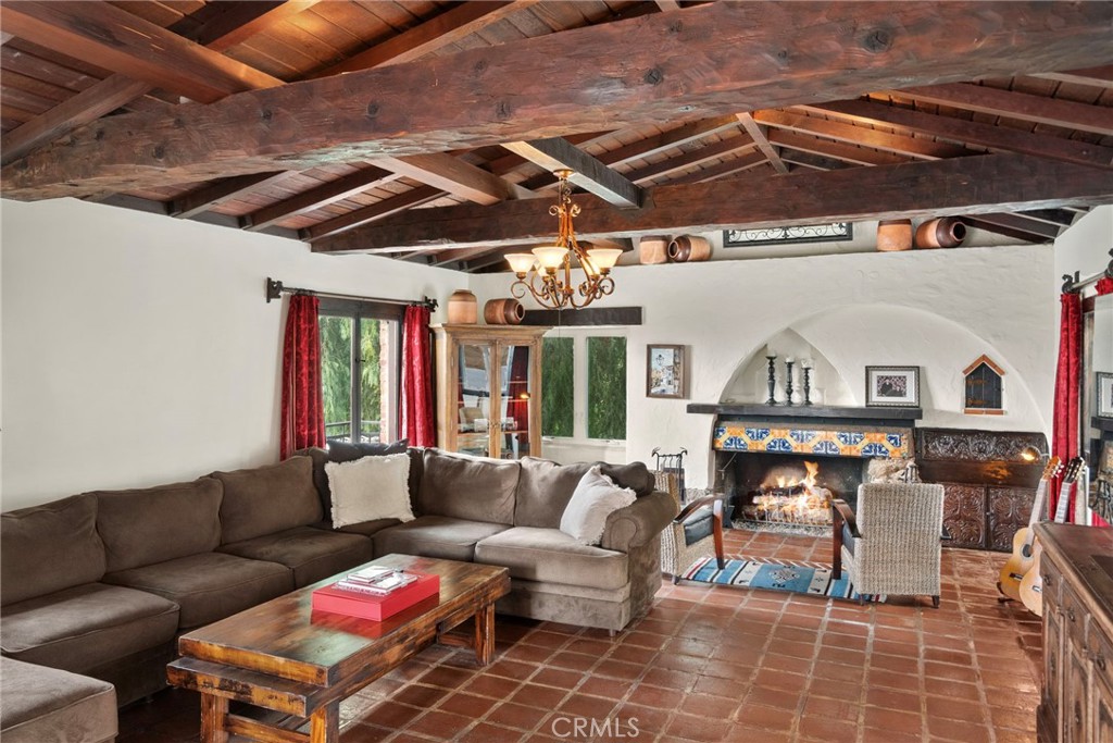 3240 Pachappa Hill Riverside, CA 92506 - Photo 24 of 75 a living room with furniture and a chandelier