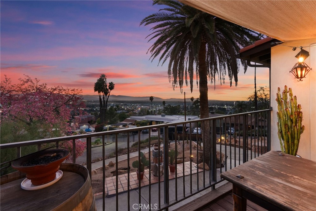 3240 Pachappa Hill Riverside, CA 92506 - Photo 47 of 75 a view of a balcony with wooden floor and outdoor seating