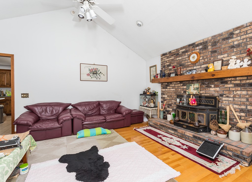 125 Bennett Road Hampden, MA 01036 - Photo 13 of 23 a living room with furniture and a fireplace