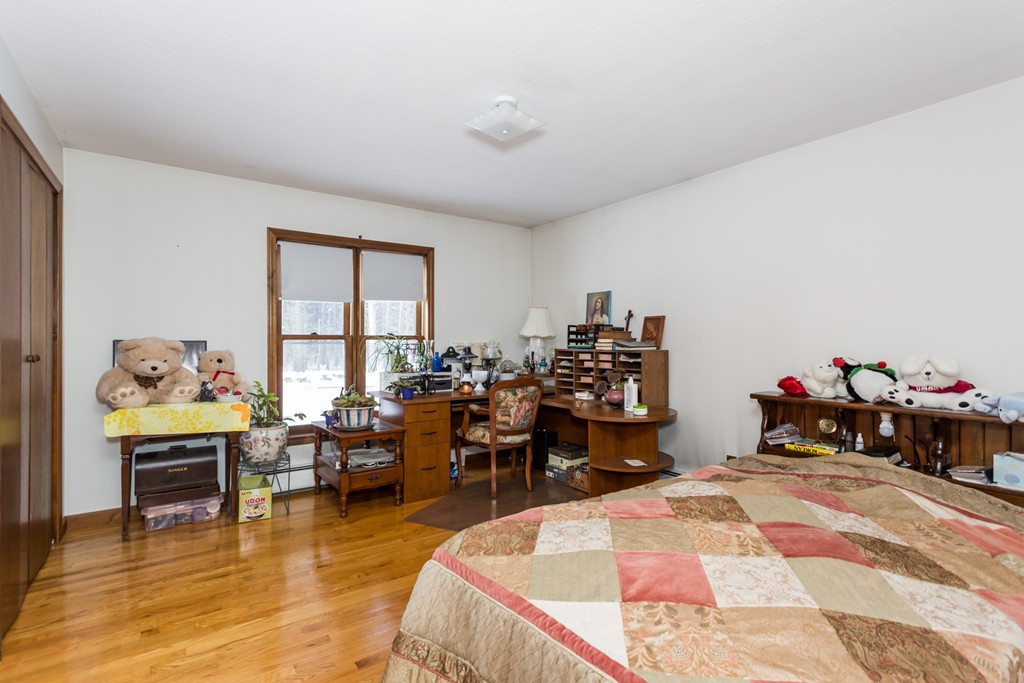 125 Bennett Road Hampden, MA 01036 - Photo 15 of 23 a living room with lots of furniture and a wooden floor
