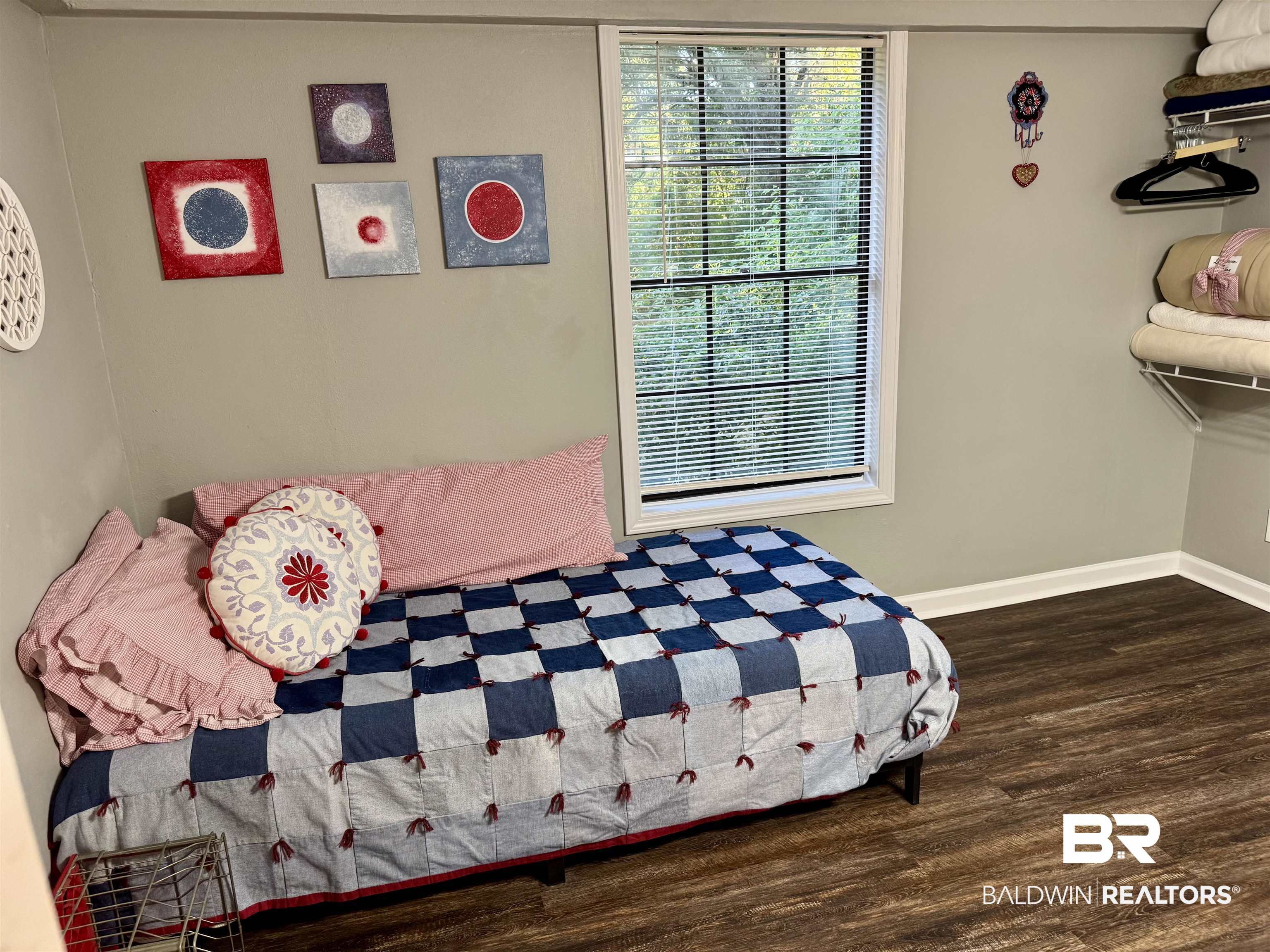 1302 Oak Street Daphne, AL 36526 - Photo 27 of 34 Bedroom with dark wood-style flooring and baseboards