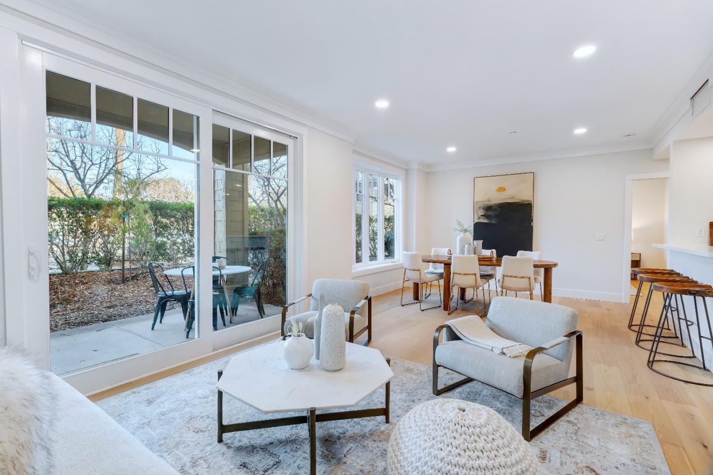 1155 Merrill Street, Unit 101 Menlo Park, CA 94025 - Photo 1 of 1 a living room with furniture and a table