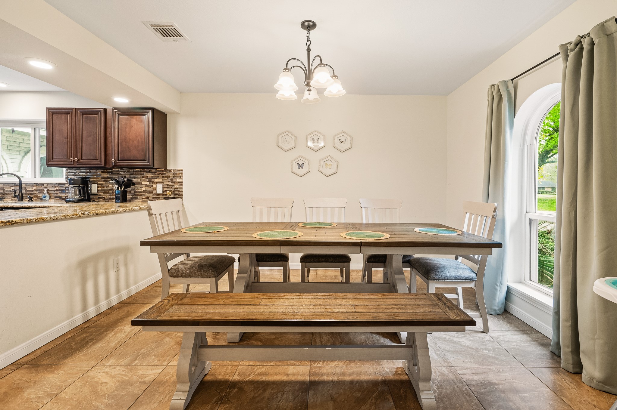16811 Waycreek Road Houston, TX 77068 - Photo 25 of 50 a view of a dining room with furniture window and wooden floor