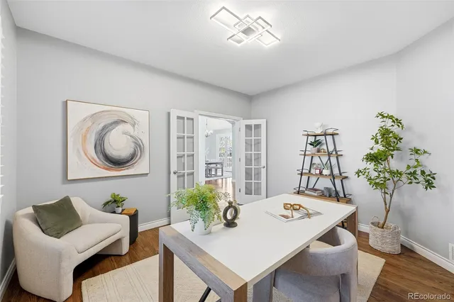 a bathroom with a sink mirror and toilet