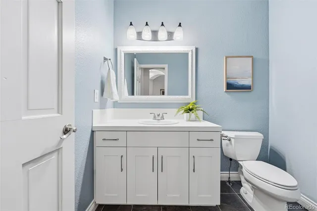 a kitchen with a stove and a sink