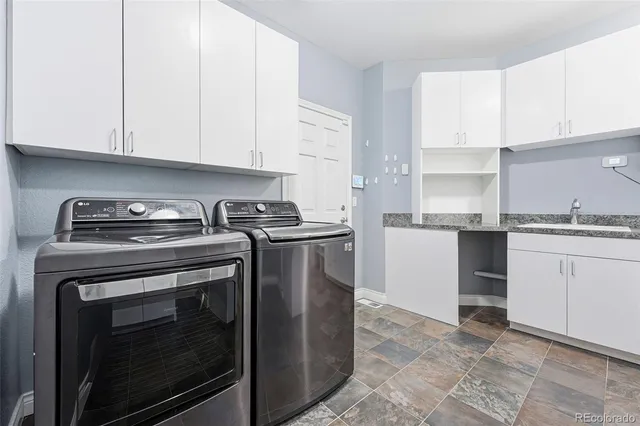 a view of entryway with wooden floor and stairs