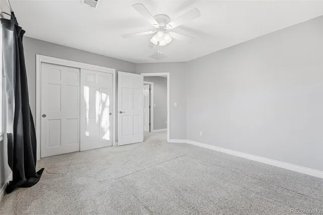 a bathroom with a double vanity sink a mirror a bathtub and shower
