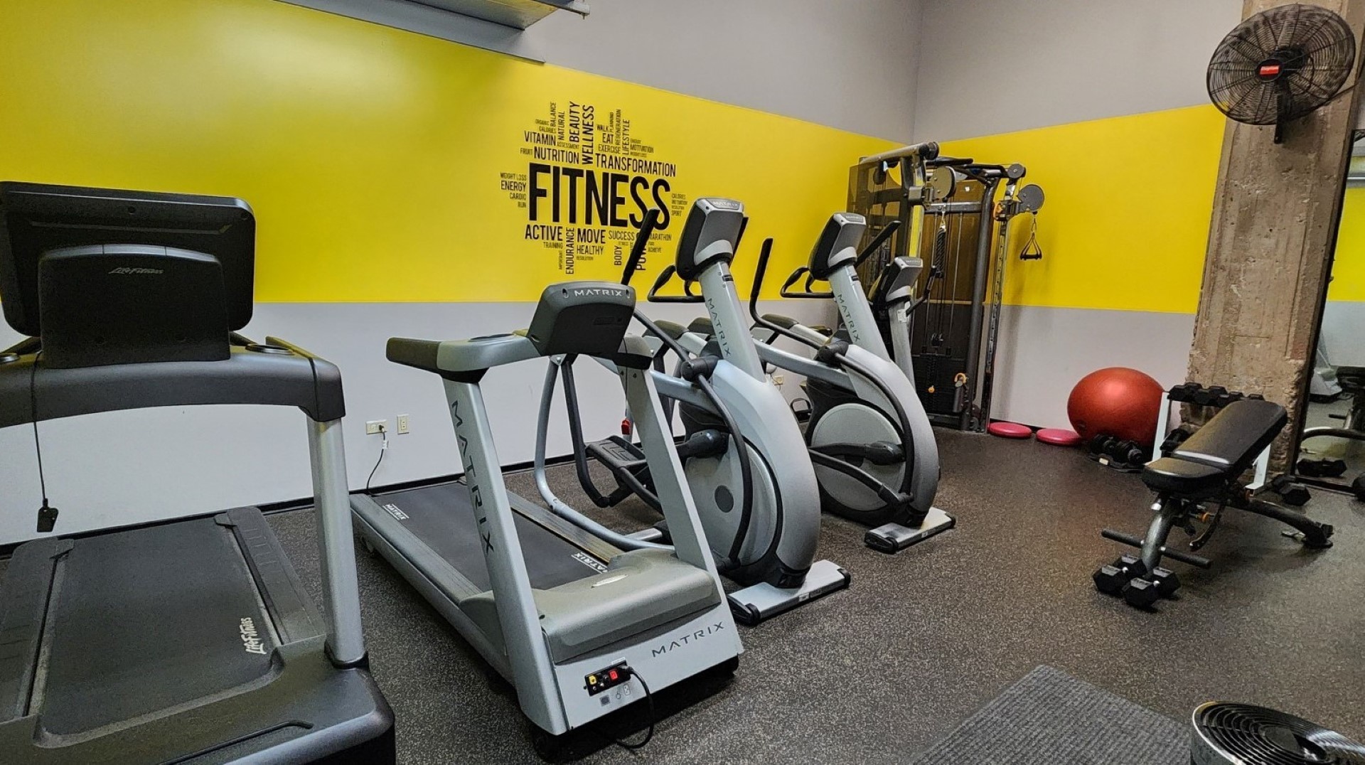 1645 West Ogden Avenue, Unit 417 Chicago, IL 60612 - Photo 17 of 19 a view of a room with gym equipment