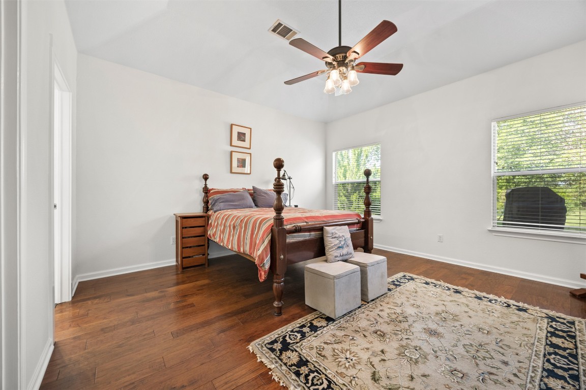 803 North Myrtle Street Georgetown, TX 78626 - Photo 17 of 40 Bedroom with dark wood finished floors and ceiling fan