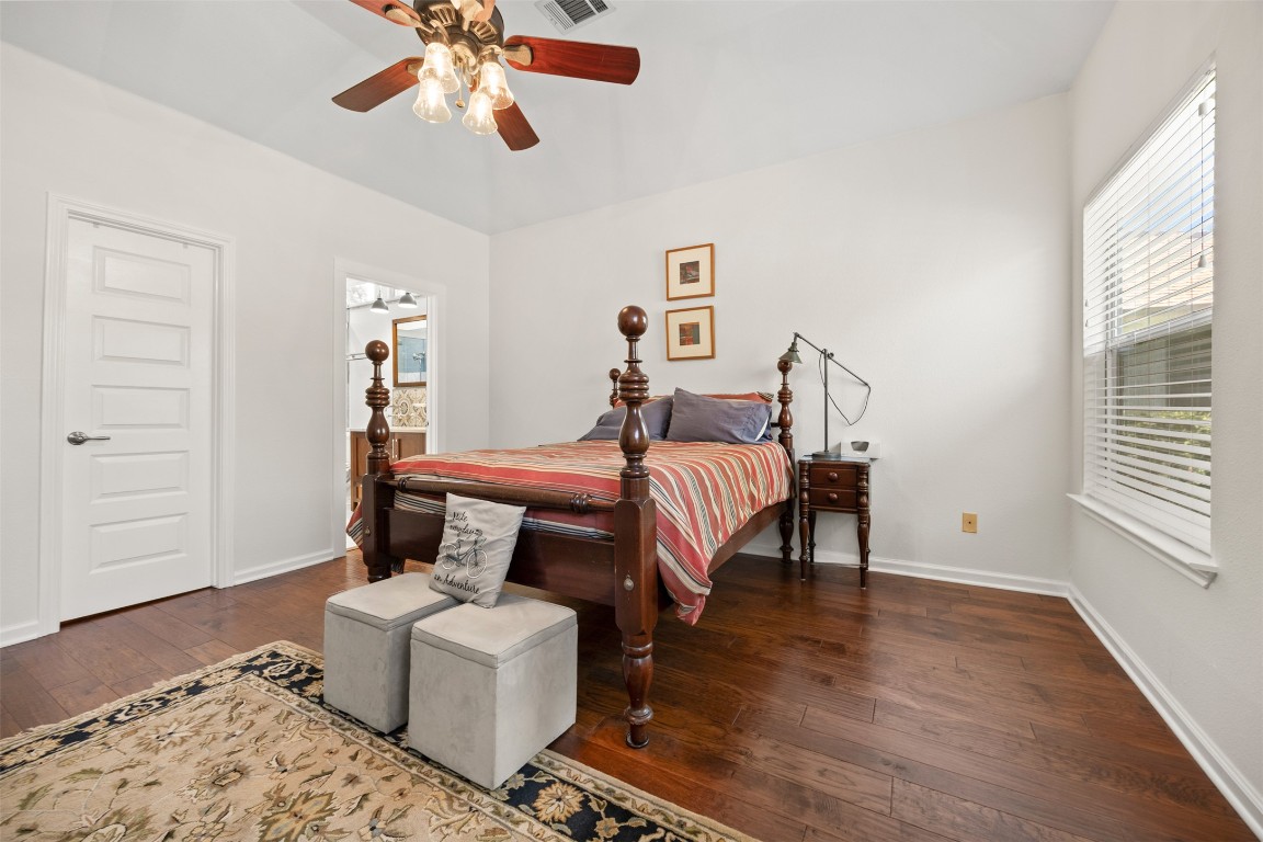 803 North Myrtle Street Georgetown, TX 78626 - Photo 19 of 40 Bedroom featuring hardwood / wood-style flooring and ceiling fan
