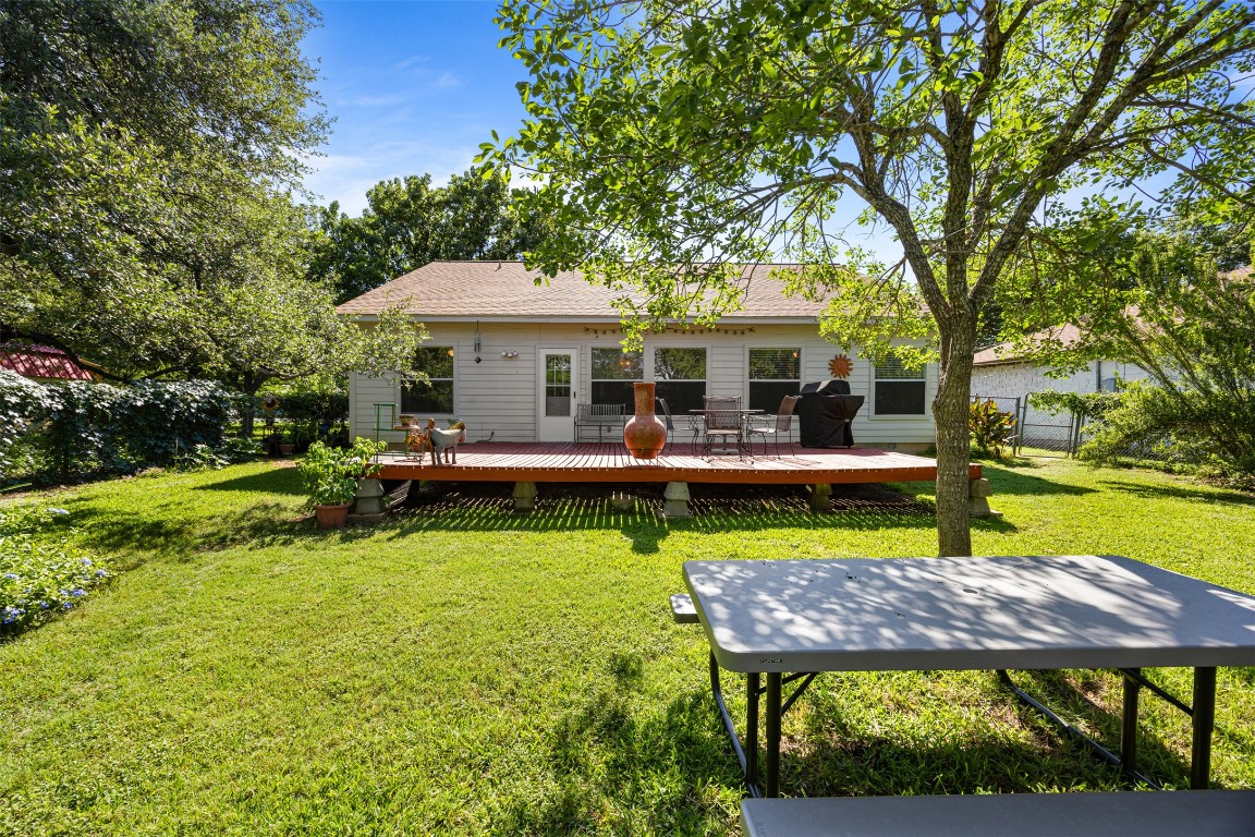 803 North Myrtle Street Georgetown, TX 78626 - Photo 28 of 40 Rear view of house with a deck and roof with shingles