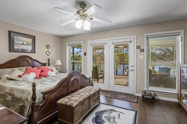 a bedroom with furniture and a window