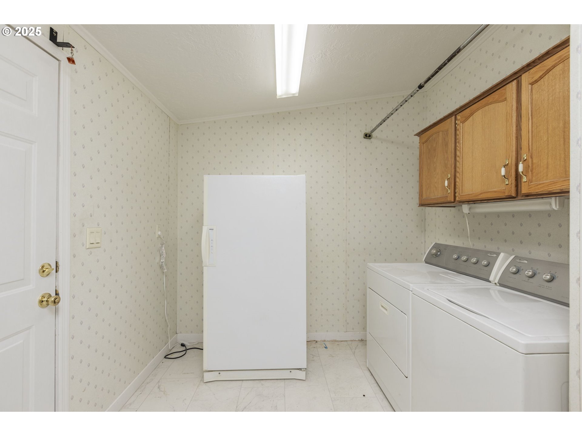 1949 Southeast Palmquist Road, Unit 80 Gresham, OR 97080 - Photo 30 of 35 a utility room with dryer and washer
