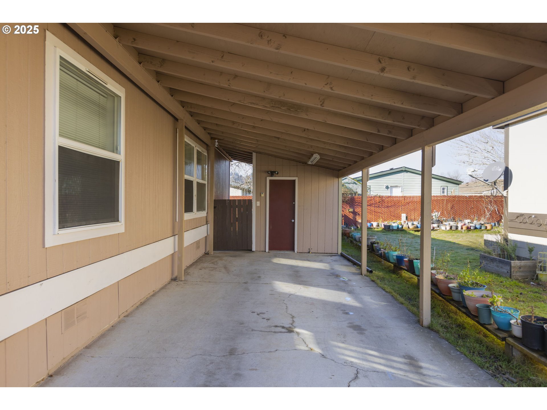 1949 Southeast Palmquist Road, Unit 80 Gresham, OR 97080 - Photo 31 of 35 a view of a porch