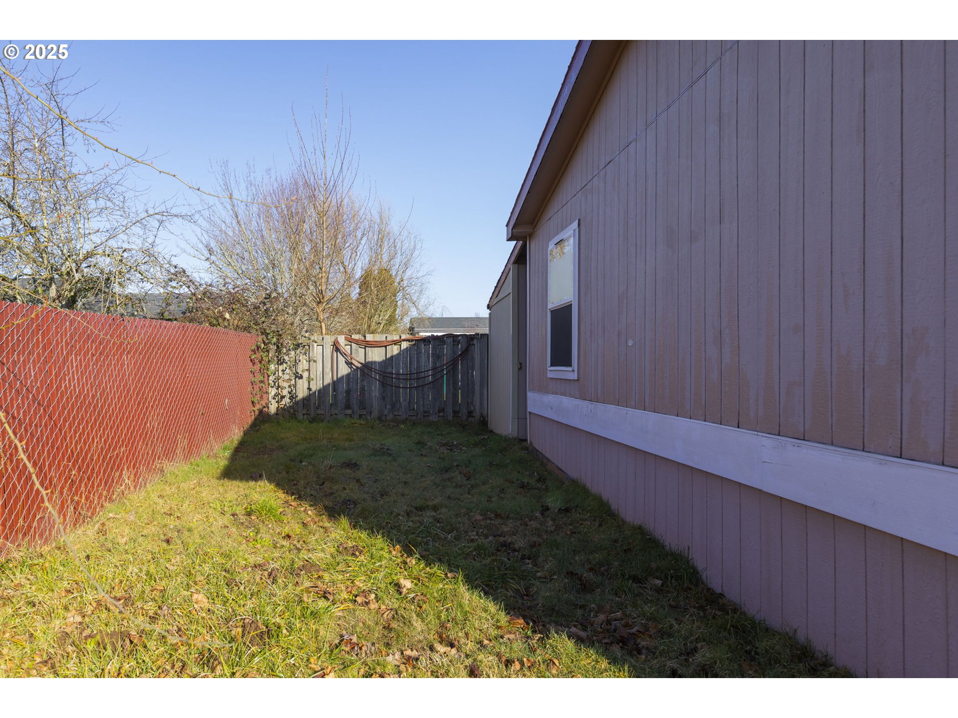 1949 Southeast Palmquist Road, Unit 80 Gresham, OR 97080 - Photo 34 of 35 a backyard of a house