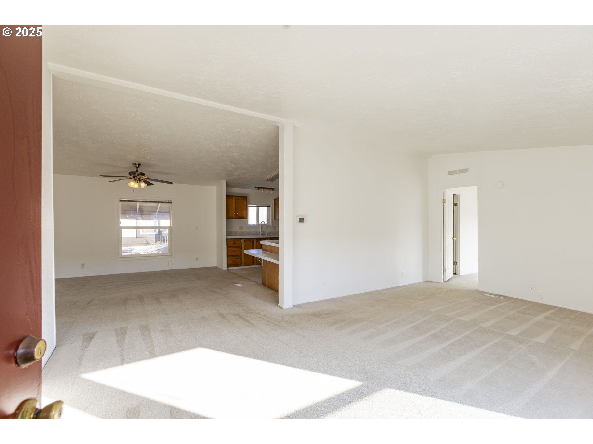 1949 Southeast Palmquist Road, Unit 80 Gresham, OR 97080 - Photo 4 of 35 a view of an empty room