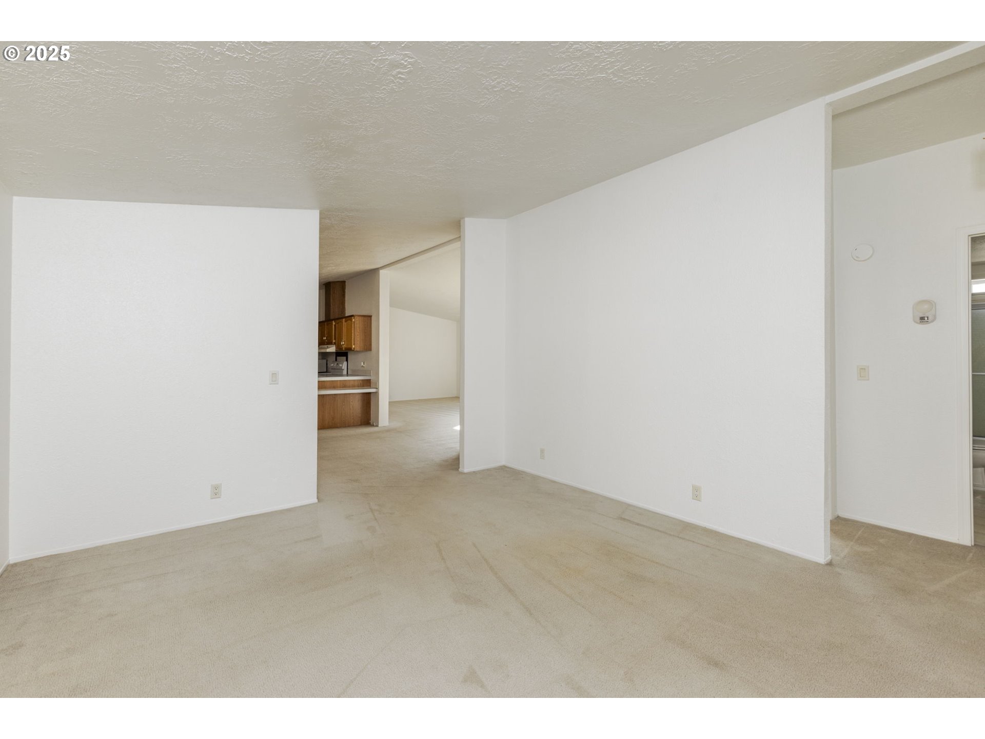 1949 Southeast Palmquist Road, Unit 80 Gresham, OR 97080 - Photo 6 of 35 a view of an empty room