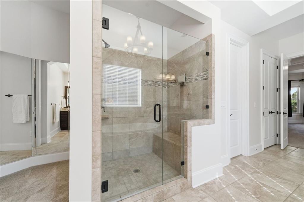 12115 Spence Way Alpharetta, GA 30004 - Photo 22 of 46 a bathroom with a shower and a sink