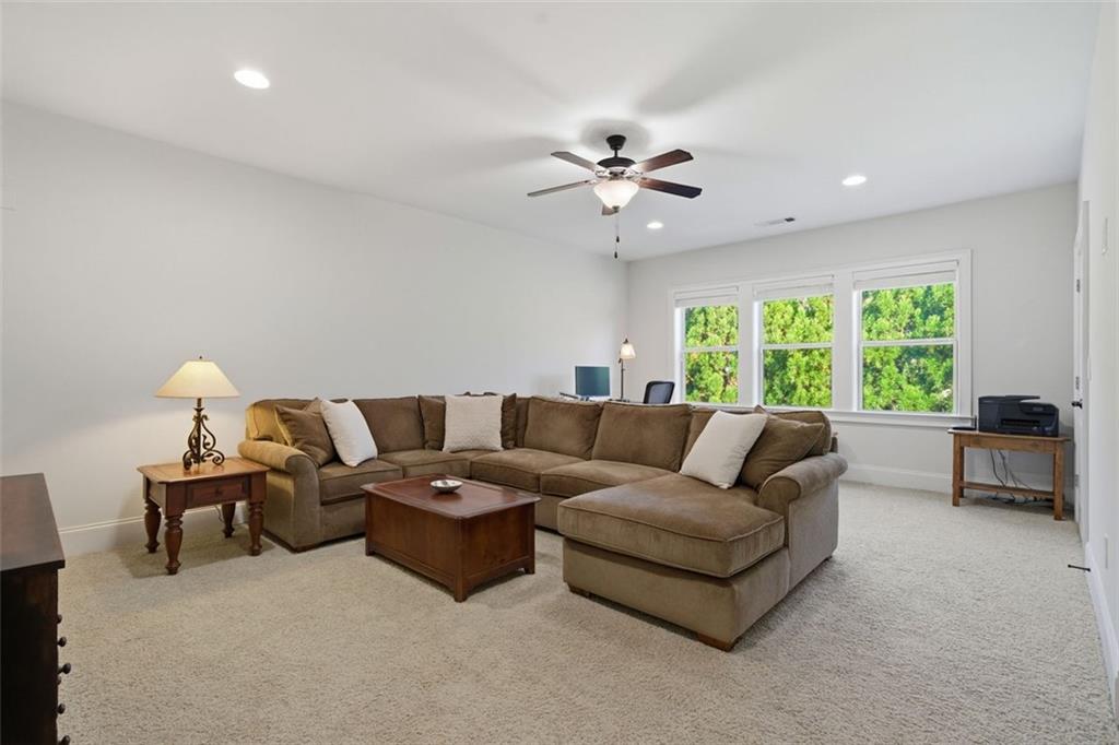 12115 Spence Way Alpharetta, GA 30004 - Photo 38 of 46 a living room with furniture and a large window