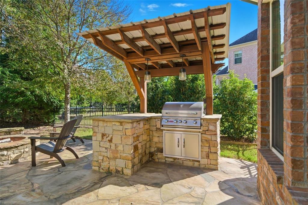 12115 Spence Way Alpharetta, GA 30004 - Photo 42 of 46 a view of an outdoor sitting area