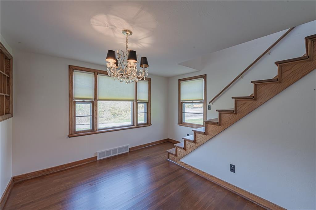 222 Maple Road Washington, PA 15301 - Photo 9 of 24 a view of an entryway with wooden floor and staircase