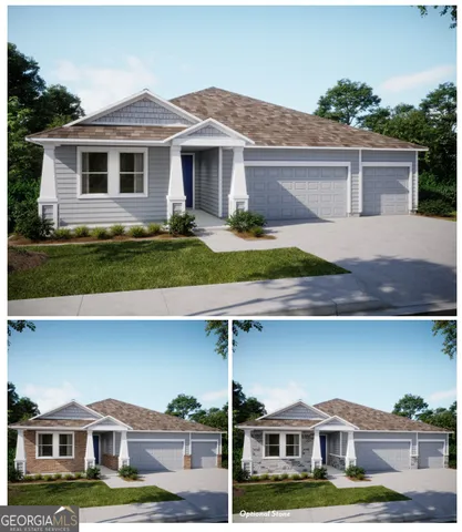 a front view of residential houses with yard and green space