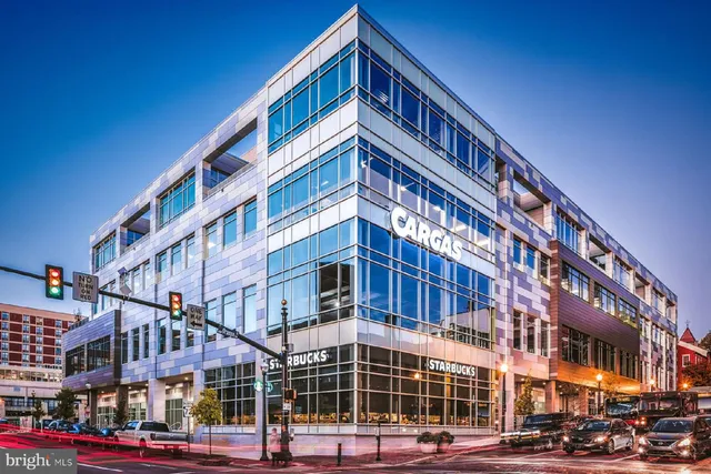 a front view of a building with street view