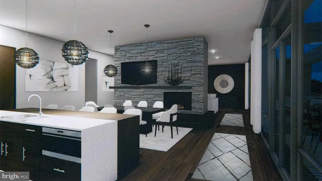 a view of a kitchen area with furniture and fireplace