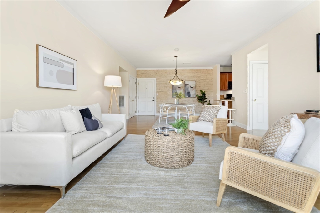 248 Albion Street, Unit 233 Wakefield, MA 01880 - Photo 15 of 39 a living room with furniture and a large window