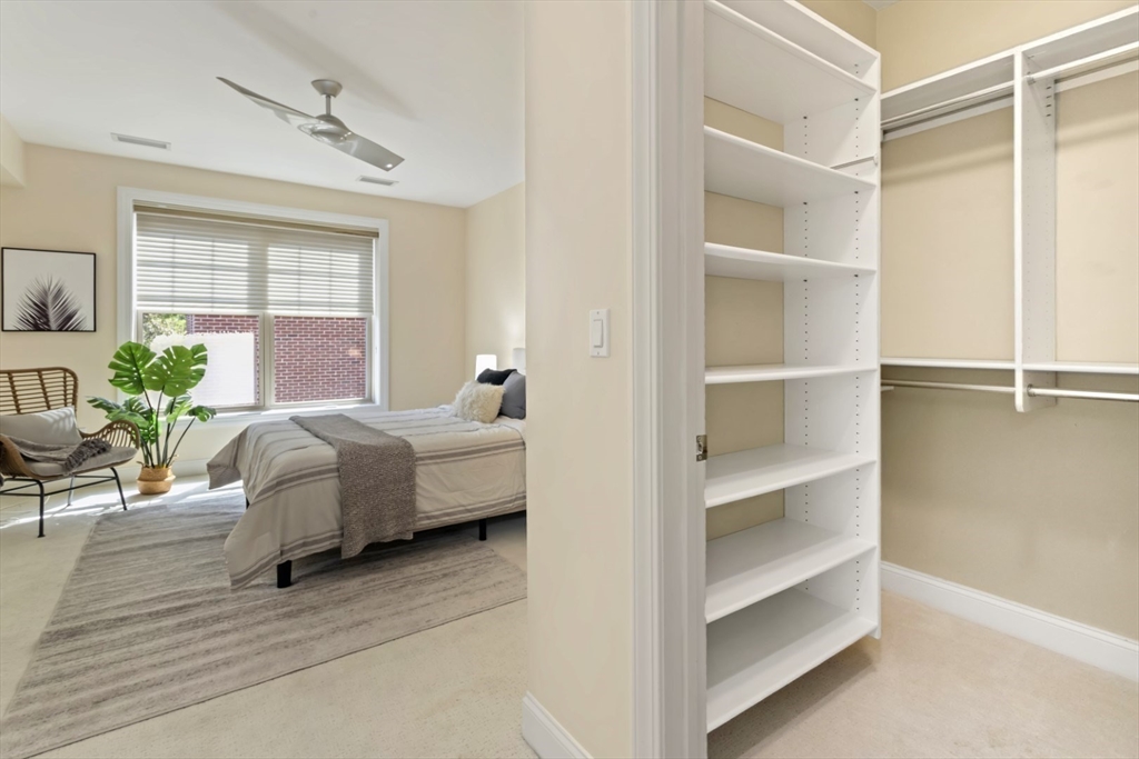 248 Albion Street, Unit 233 Wakefield, MA 01880 - Photo 25 of 39 a bedroom with a bed and window