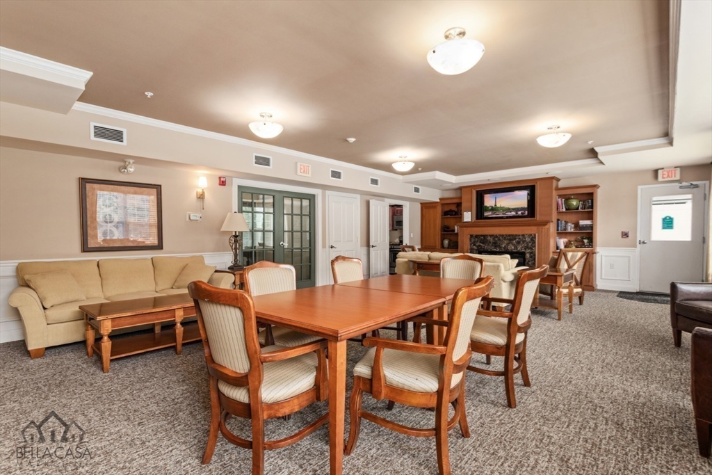 248 Albion Street, Unit 233 Wakefield, MA 01880 - Photo 37 of 39 a view of a dining room with furniture