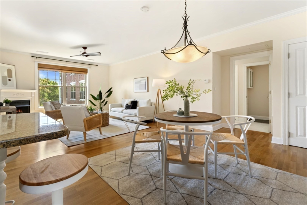 248 Albion Street, Unit 233 Wakefield, MA 01880 - Photo 8 of 39 a view of a dining room with furniture window and wooden floor