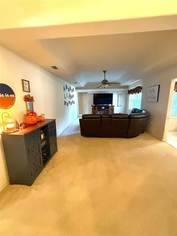 a bedroom with bed and window