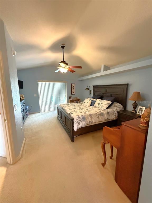 4980 Southeast 47th Terrace Road Ocala, FL 34480 - Photo 22 of 54 a bedroom with bed and window