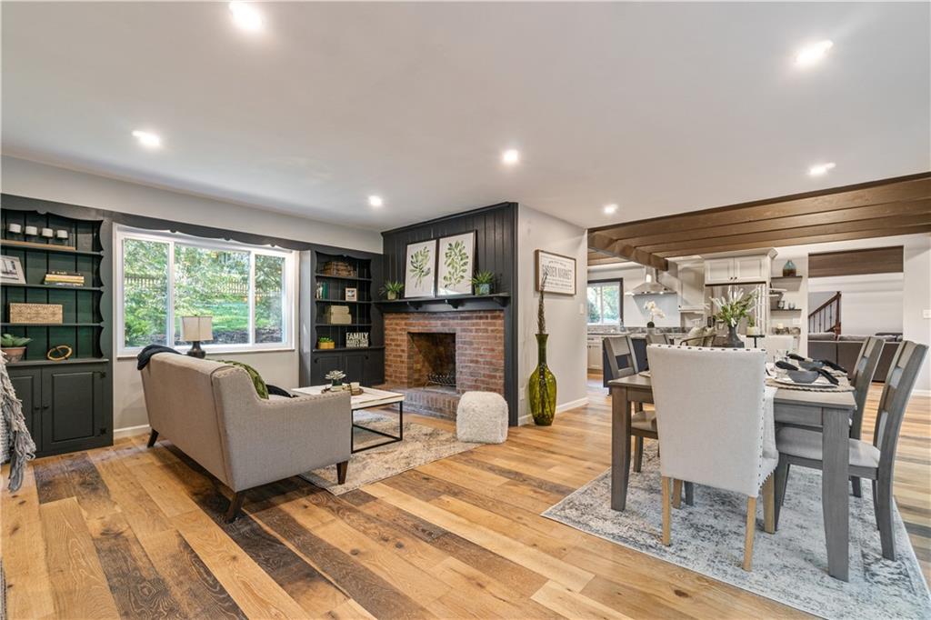 1836 Kent Road Pittsburgh, PA 15241 - Photo 17 of 50 a living room with fireplace furniture and a wooden floor