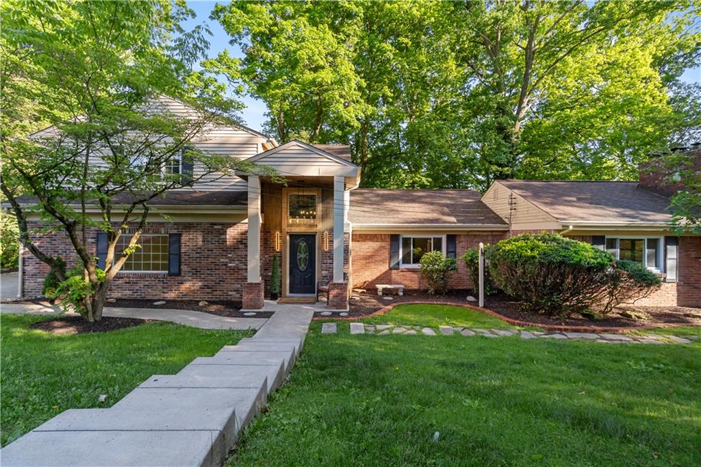 1836 Kent Road Pittsburgh, PA 15241 - Photo 3 of 50 a front view of a house with a garden