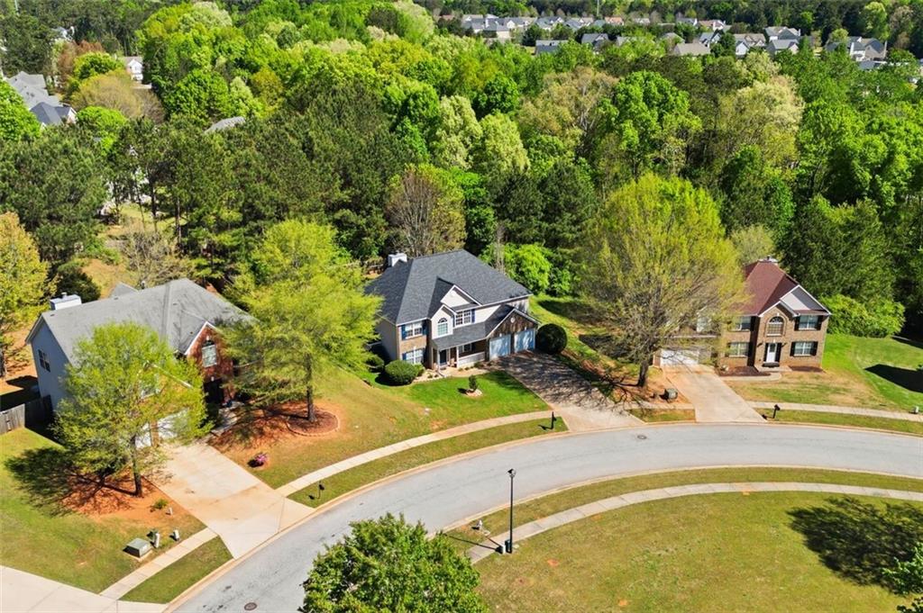 640 Howell Drive Locust Grove, GA 30248 - Photo 33 of 41 an aerial view of a house with a swimming pool