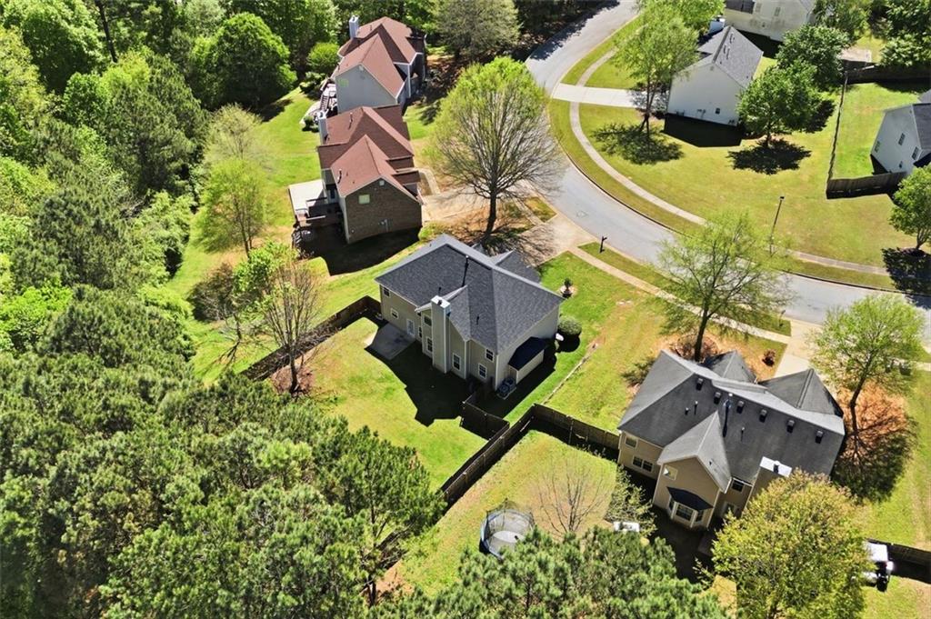 640 Howell Drive Locust Grove, GA 30248 - Photo 35 of 41 an aerial view of houses with yard
