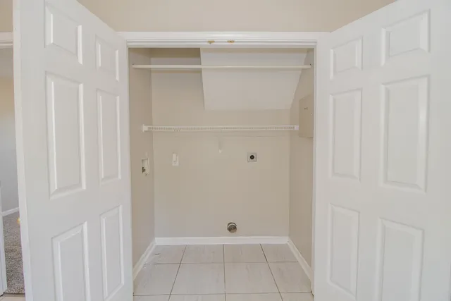 a bathroom with a sink a toilet a mirror a bathtub and shower