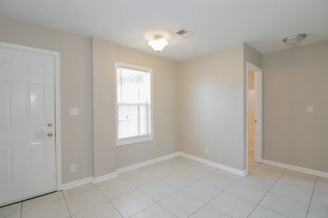 a view of an empty room with window