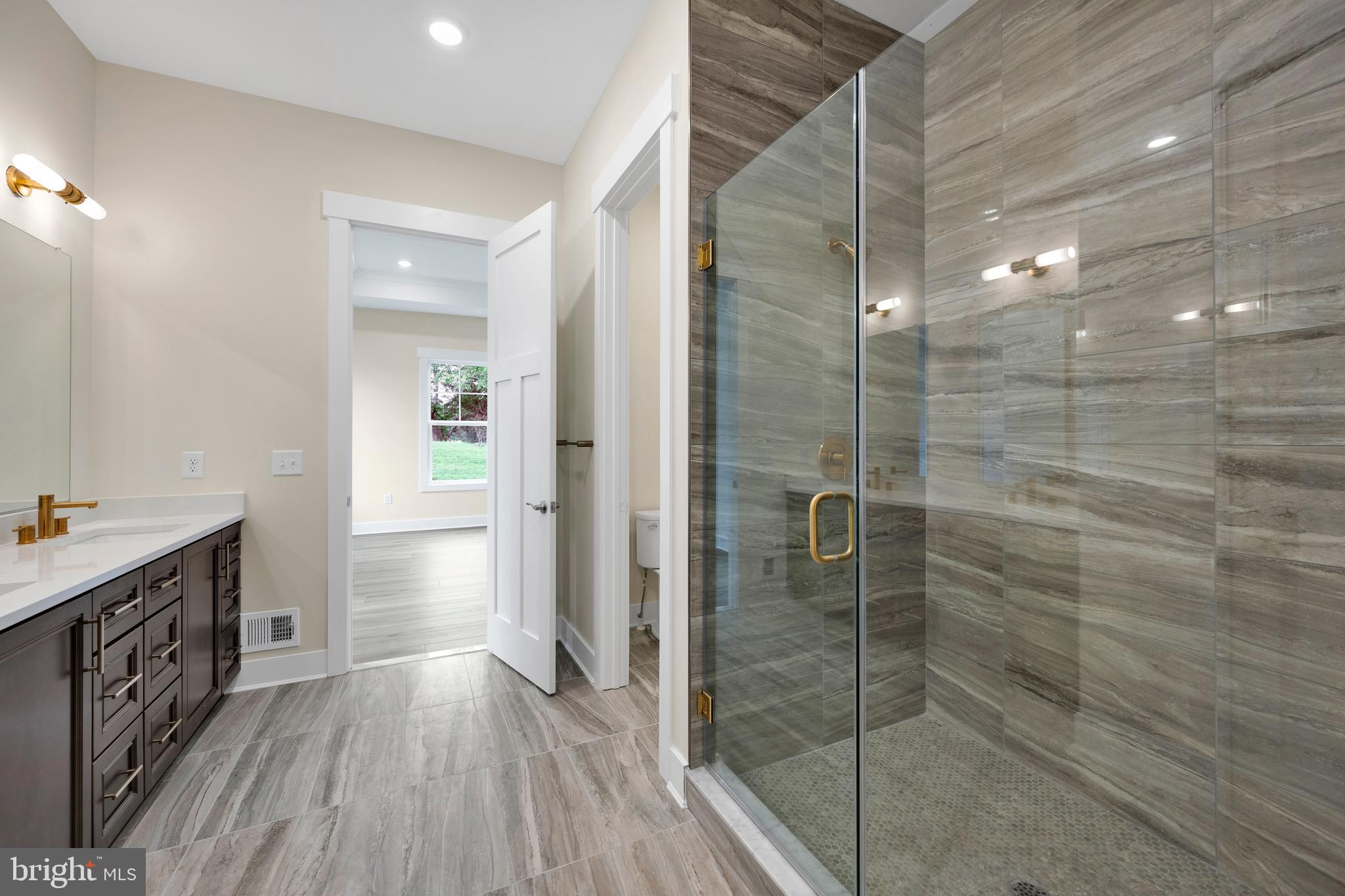 23412 East Gate Drive Frankford, DE 19945 - Photo 22 of 28 a bathroom with a shower