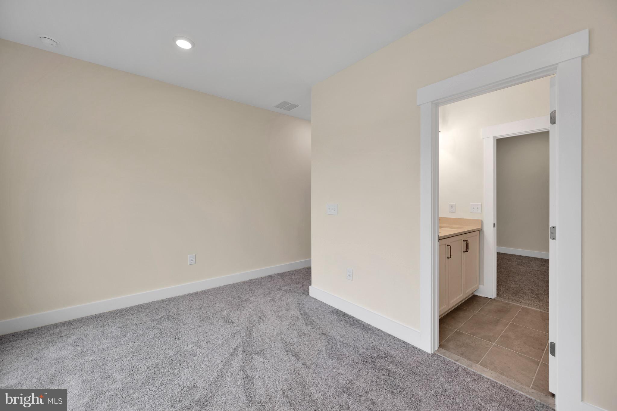 23412 East Gate Drive Frankford, DE 19945 - Photo 25 of 28 an empty room with a bathroom