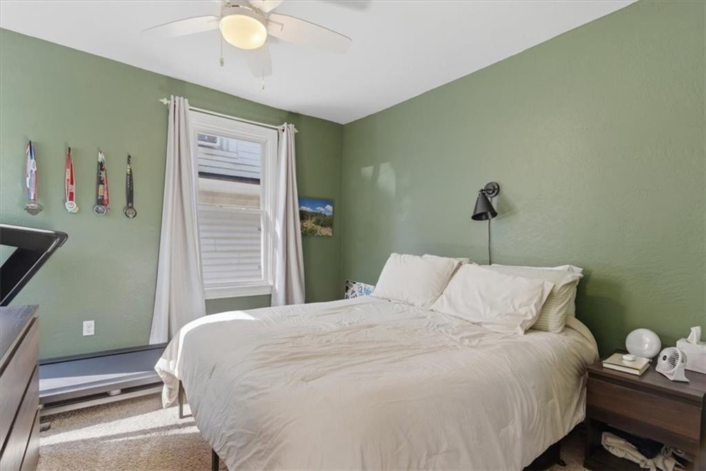 246 Dunseith Street Pittsburgh, PA 15213 - Photo 14 of 36 a bedroom with a bed and a window