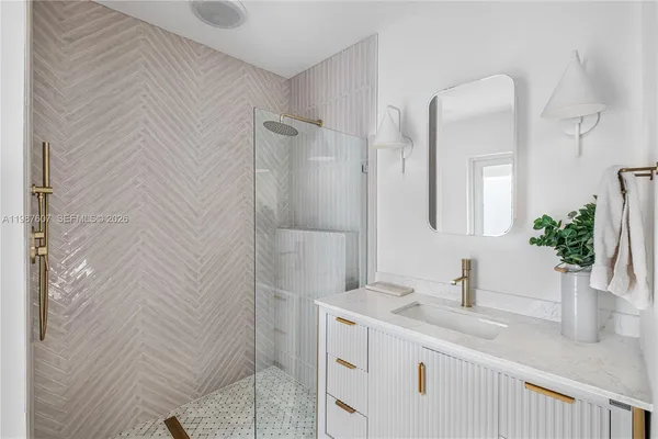 swimming pool view with a seating space