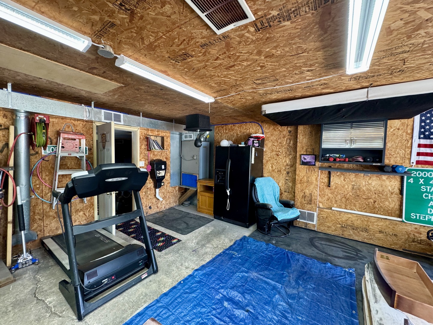 301 West Jackson Street Ohio, IL 61349 - Photo 11 of 32 a living room with furniture a wooden floor and next to a window